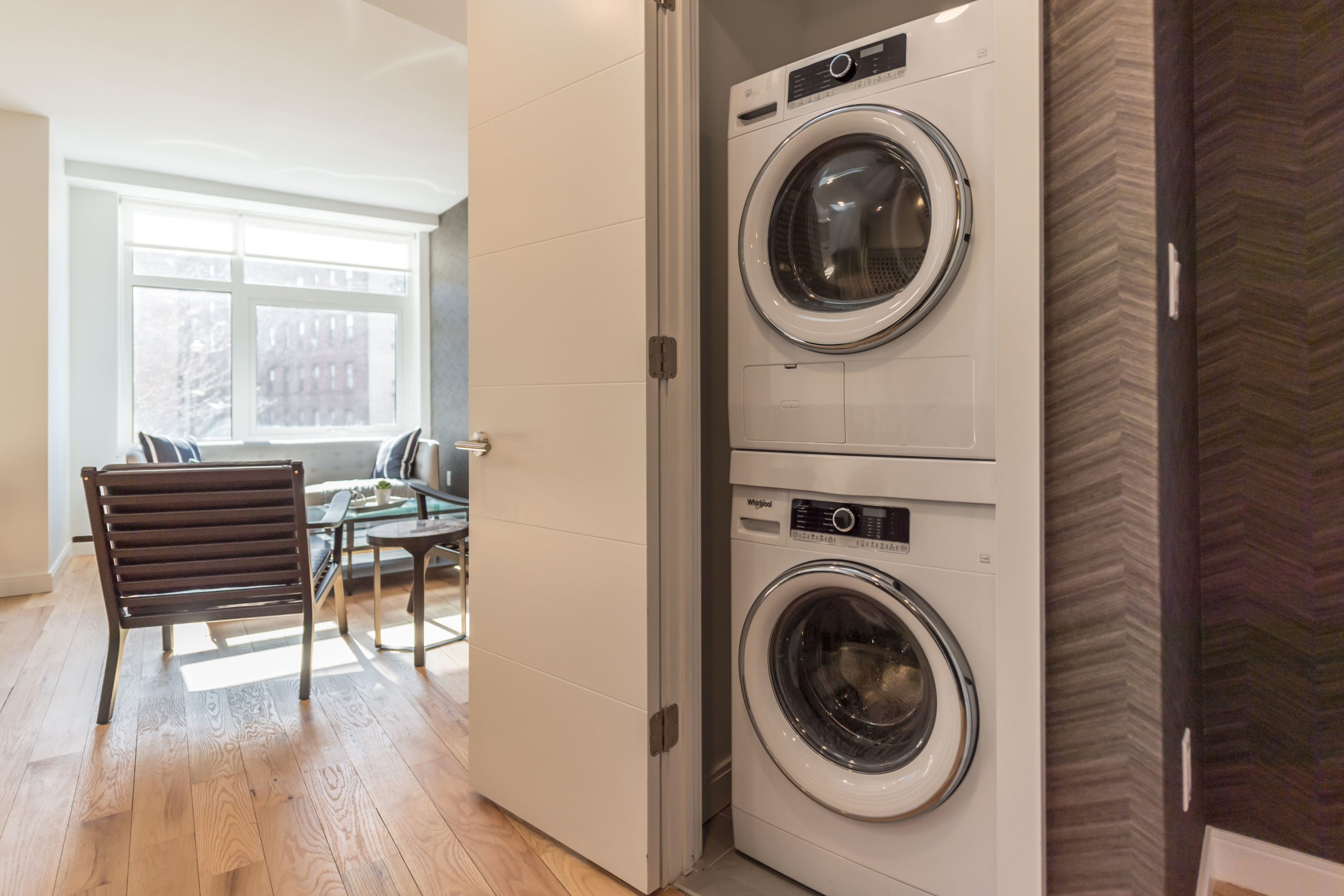 A stacked washer and dryer inside an apartment at the Vitagraph Brooklyn